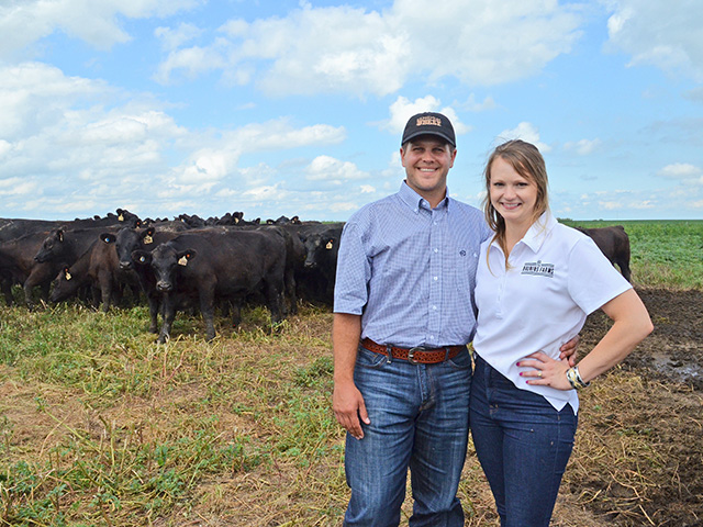 The shift from private treaty sales to public auction is helping Reiss and Heather Bruning define this herd. (DTN/Progressive Farmer photo by Victoria G. Myers)